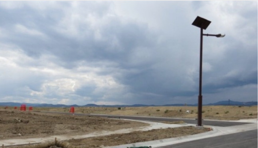 Solar-paneled street lamps line roads for future residential development near Rocky Flats by Nicolene Durham