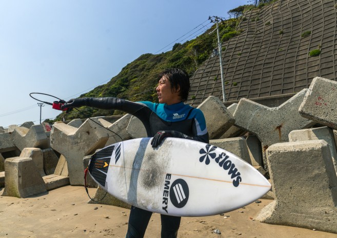 Japanese surfer in the contaminated area after the daiichi nuclear power plant irradiation, Fukushima prefecture, Tairatoyoma beach, Japan