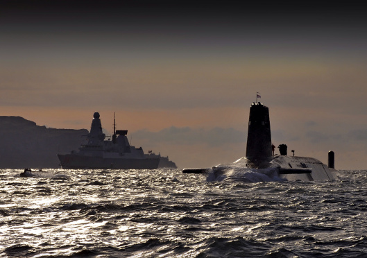 Nuclear Submarine HMS Vanguard Passes HMS Dragon as She Returns to HMNB Clyde, Scotland